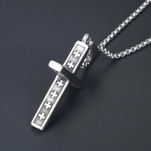 Vintage silver stainless steel necklace featuring a cross pattern engraved pendant on a chain