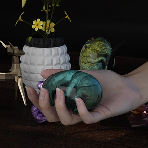 Dettaglio di un uovo di drago in resina con baby drago per stampi in silicone fai-da-te