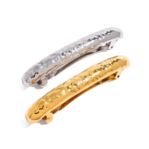 Minimalist stainless steel hammered hair clips in gold and silver with metallic texture