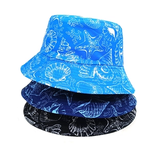 Three-pack of bucket hats featuring white ocean creature prints on blue and black fabric
