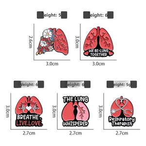 Set of anatomical lung enamel pins with floral medical designs and dimensions details