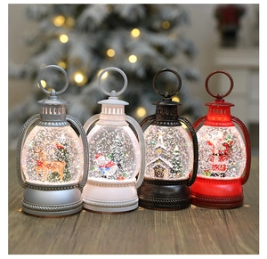 Close-up of four festive Christmas water lanterns with Santa, snowmen and reindeer