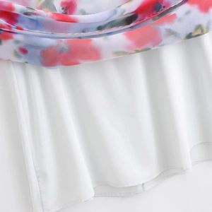 Close-up of floral print halter midi dress showing dual-layer fabric and quality seams