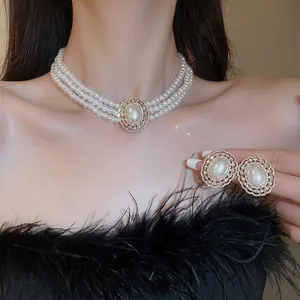 Elegant multi-layer pearl necklace and stud earrings set with crystal inlay accents