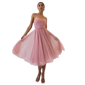 Pink mesh corset strapless A-line party dress for women featuring a voluminous flared skirt