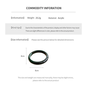 Macro detail of acrylic bangle with dark green marble texture and size measurements