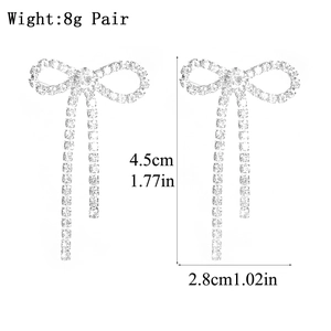 Sparkling rhinestone bow tassel earrings in silver finish, size 4.5cm by 2.8cm