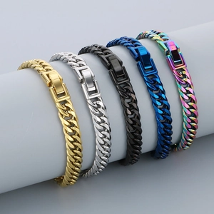 Polished stainless steel Cuban chain bracelets in five colors on a cylindrical stand