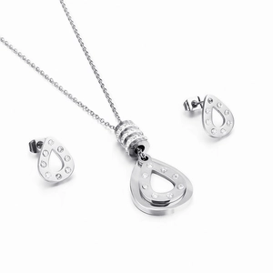 Silver teardrop necklace and earrings set with sparkling rhinestones in a modern style
