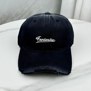 Detail of distressed brim and Fantastic white embroidery on black baseball cap