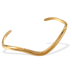 Bracelet jonc doré en forme de vague au design minimaliste et style vintage français