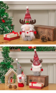 Detail of Christmas gnome with knit hat, reindeer antlers and festive bow tie