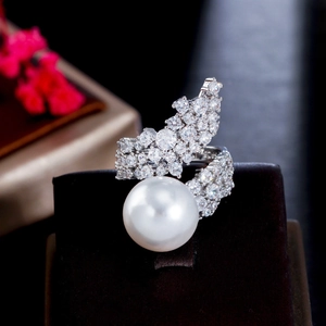 Elegant silver pearl ring with sparkling zircon pavé on a premium jewelry display box