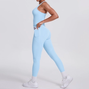 Detail shot of light blue yoga leggings with functional side pocket for mobile phone