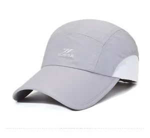 Detail view of breathable side mesh and logo on light gray quick-dry baseball cap