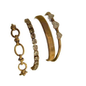 Four-piece stackable gold stainless steel bracelet set with heart charms and crystal links