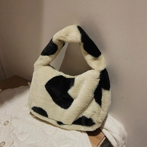 Bolso de peluche con estampado de vaca en blanco y negro y asa suave de moda