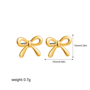 Detailed view of 18K gold bow stud earrings with size measurements and weight info