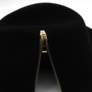 Black pure wool bucket hat featuring a stylish vertical gold metal zipper detail