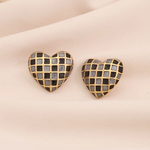 Minimalist heart earrings with black checkered enamel inlay and gold metallic border