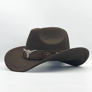 Classic dark brown western cowboy felt hat with vintage metal bull head emblem