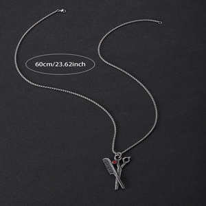 Silver scissors and comb pendant necklace with red gem and 60cm stainless steel chain
