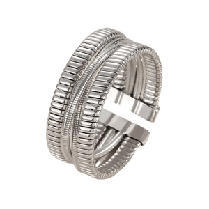 Detailed close-up of layered silver metal ring featuring textured snake bone chains