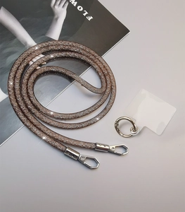 Crossbody phone lanyard with brown glitter texture and silver metal swivel hooks