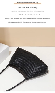 Detail of black leather woven shoulder bag with intricate braid pattern and strap