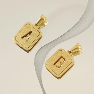 Gold 18K titanium steel letter A and B pendants with sandblasted matte finish