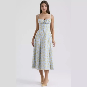 Slim fit light blue floral backless midi dress with spaghetti straps and high slit