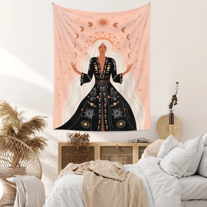 Detail of bohemian tapestry featuring female astrologer design and moon phase cycle background