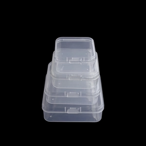 Detailed view of four stacked transparent PP plastic storage boxes with secure snap locks