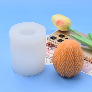Detail of Easter egg silicone mold set with textured herringbone aromatherapy candle pattern