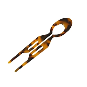 U-shaped acetate hair pin with classic tortoiseshell pattern for elegant bun styling