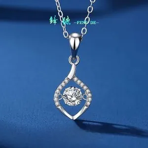 Detailed macro view of S925 silver dancing stone swan necklace pendant with blue background