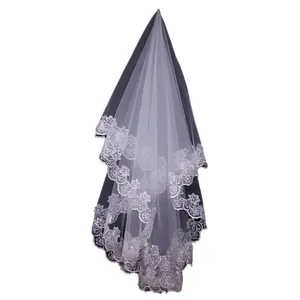 Elegant white bridal wedding veil with intricate floral lace embroidery and double layers