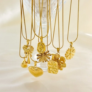 Elegant 18K gold plated titanium steel snake chain necklaces with diverse artistic pendants