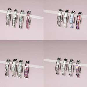 Silver curved stainless steel navel rings with opal and zircon in four styles