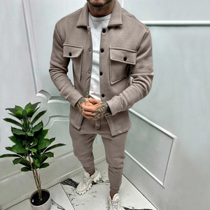 Detail of men's khaki suede casual set featuring button-up jacket and matching joggers