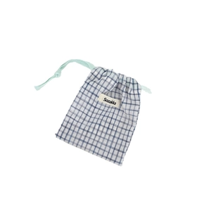 Blue and white plaid drawstring storage pouch made of cotton linen for small items
