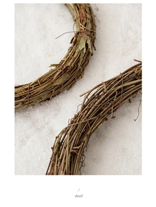Close-up of natural dried rattan wreath base showing handmade vine texture and details