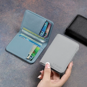 Detailed macro view of leather wallet interior with multiple slots for bank cards