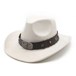 Detail of vintage silver bull head buckle and studs on a suede western cowboy hat