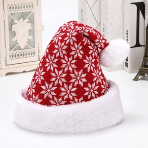 Bonnet de Noël rouge en tricot épais avec motifs de flocons et bordure peluche
