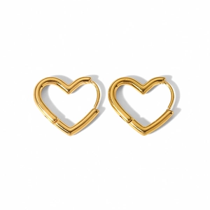 Detailed view of polished 18K gold stainless steel heart hoop earrings on white background