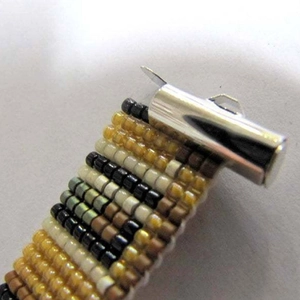 Multicolor beaded bracelet with secure silver slide tube clasp jewelry connector