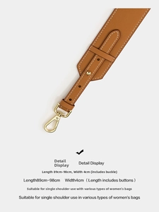 Detail of adjustable 4cm wide brown leather shoulder strap with golden metal swivel hooks