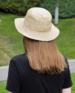 Back view of a beige waterproof sun hat with breathable fabric for outdoor hiking