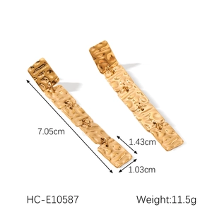 Detail view of 18K gold plated hammered square fringe earrings with size measurements